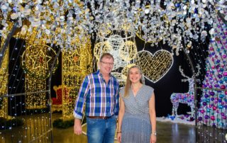 Fizzco's directors stood under a light up arch in the opening of the showroom.