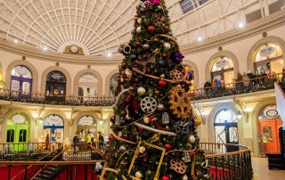 Large-scale Christmas Tree designed by Fizzco Projects at Leeds Corn Exchange Shopping Centre for the Christmas season.